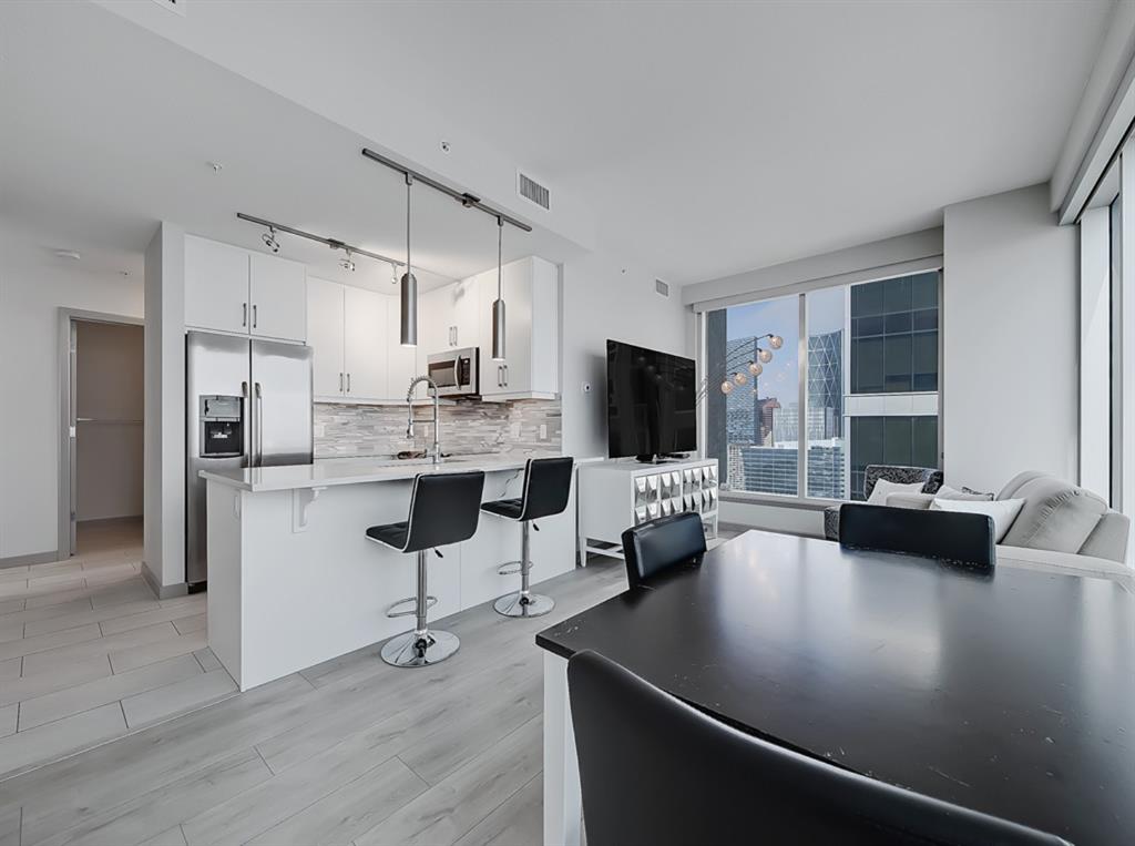 interior kitchen and dining at Alura condo in Calgary, Alberta